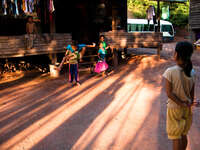 boy jumping game Vientiane, Hin Boun Village, South East Asia, Laos, Asia