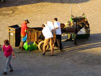 view--garbage men in djemaa el-fna Marrakech, Interior, Morocco, Africa
